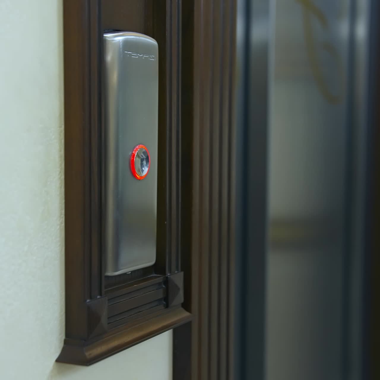 Man's hand presses a lift button. Man pressing elevator button in office center or hotel. Progress future startup concept. Close-up
