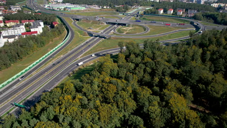 cars driving through the expressway on a sunny day in gdynia, poland