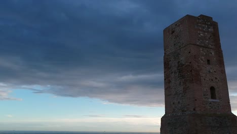 drone view of the thieves tower, on cabopino beach in marbella, declared a monument of tourist interest