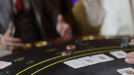 people playing poker at the casino.