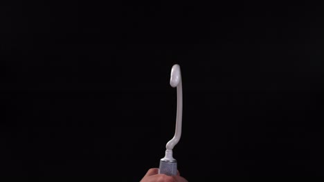 experimento de expulsión de la pasta de dientes