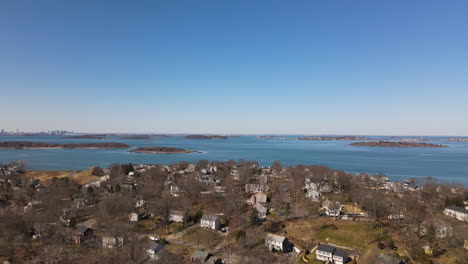 aerial drone footage over hingham ma with boston in the far distance