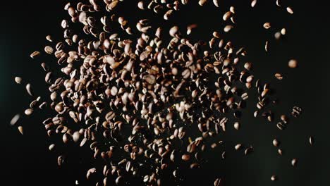 the coffee beans are thrown into the air