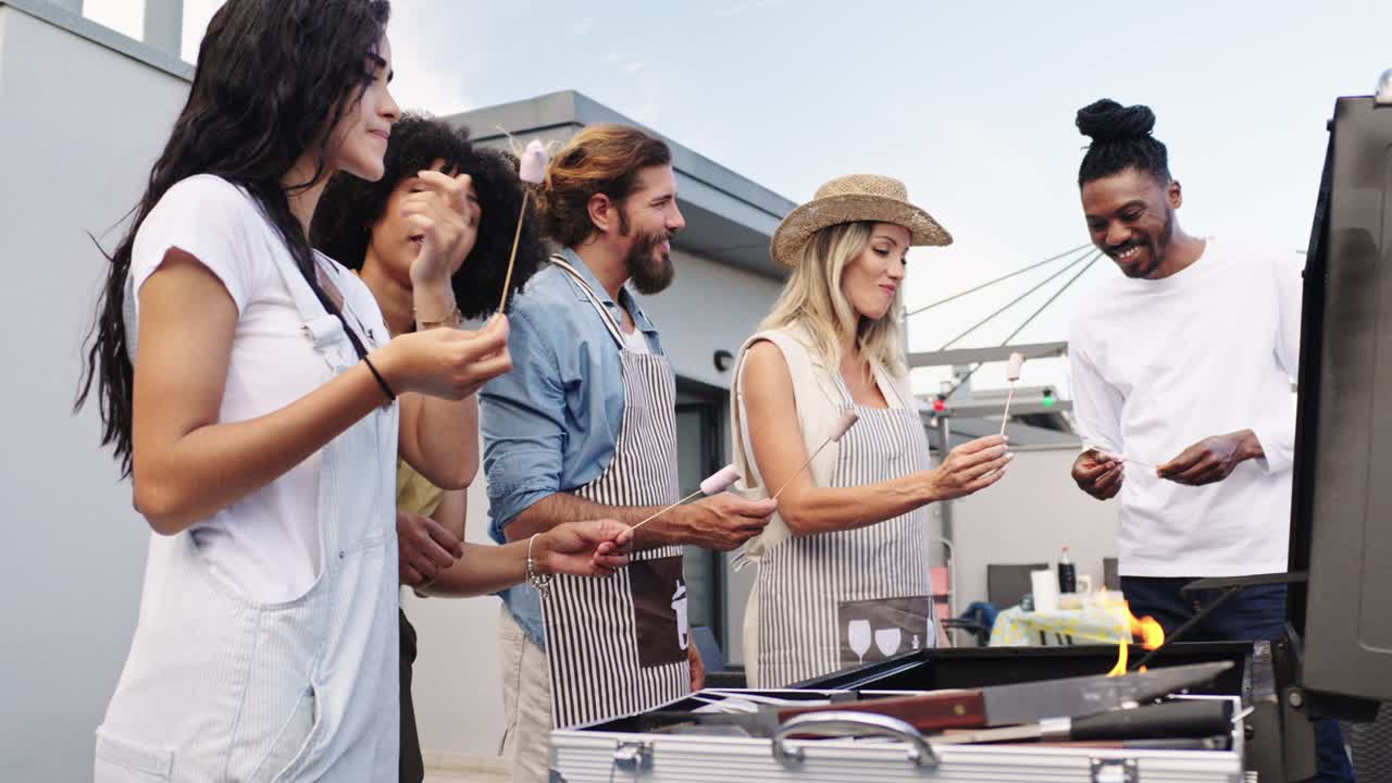 Group of friends having a barbecue on the rooftop