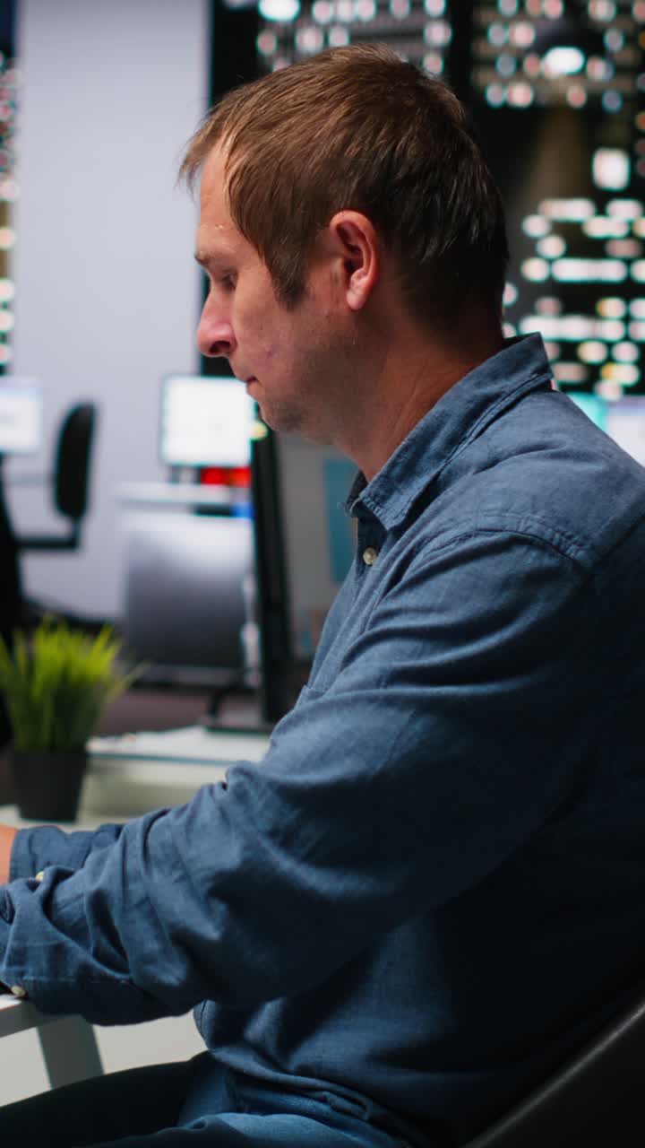 Vertical Video Male skilled editor using AI chatbot turning text prompt into photos