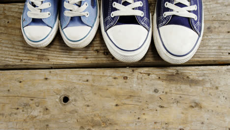 Pairs-of-new-shoes-on-wooden-plank