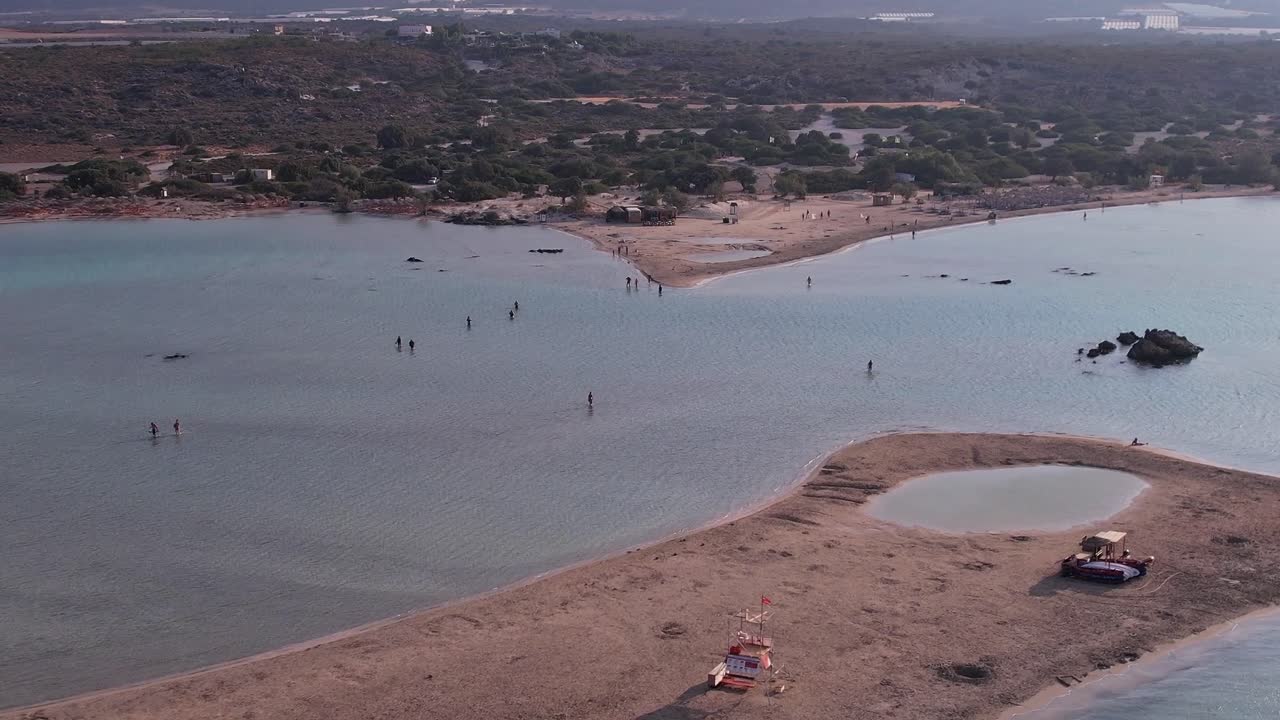 Aerial View of a Shallow Turquoise Lagoon Beach in Greece