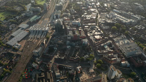 High-pan-down-aerial-shot-over-central-Reading-UK