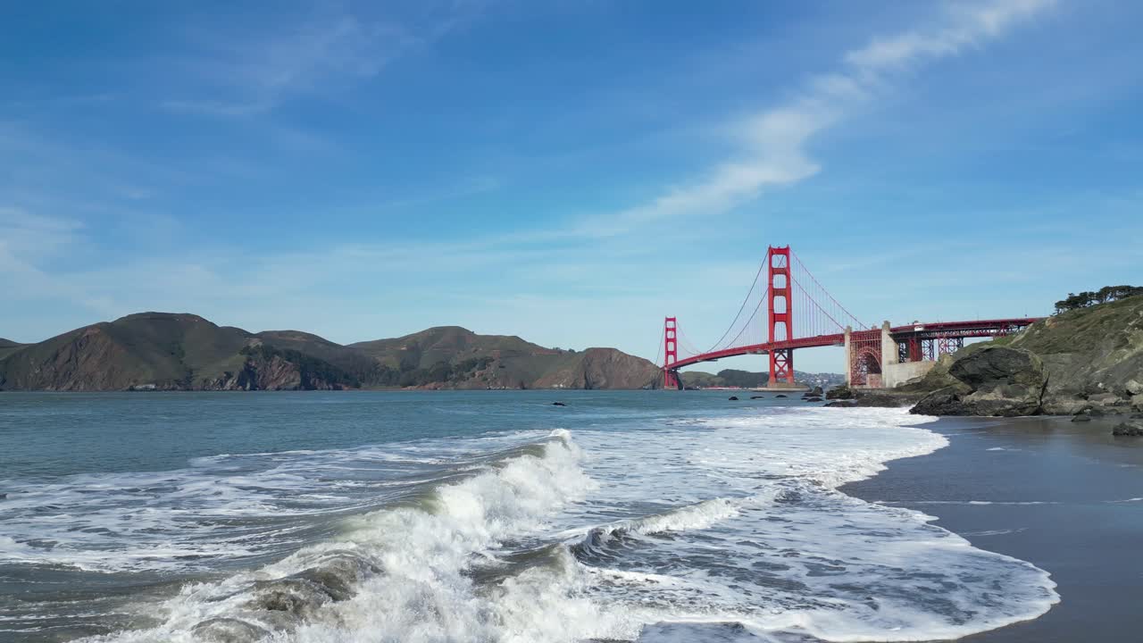 A Bird's eye view of a beautiful beach overlooking the Golden Gate Bridge in San Francisco, California