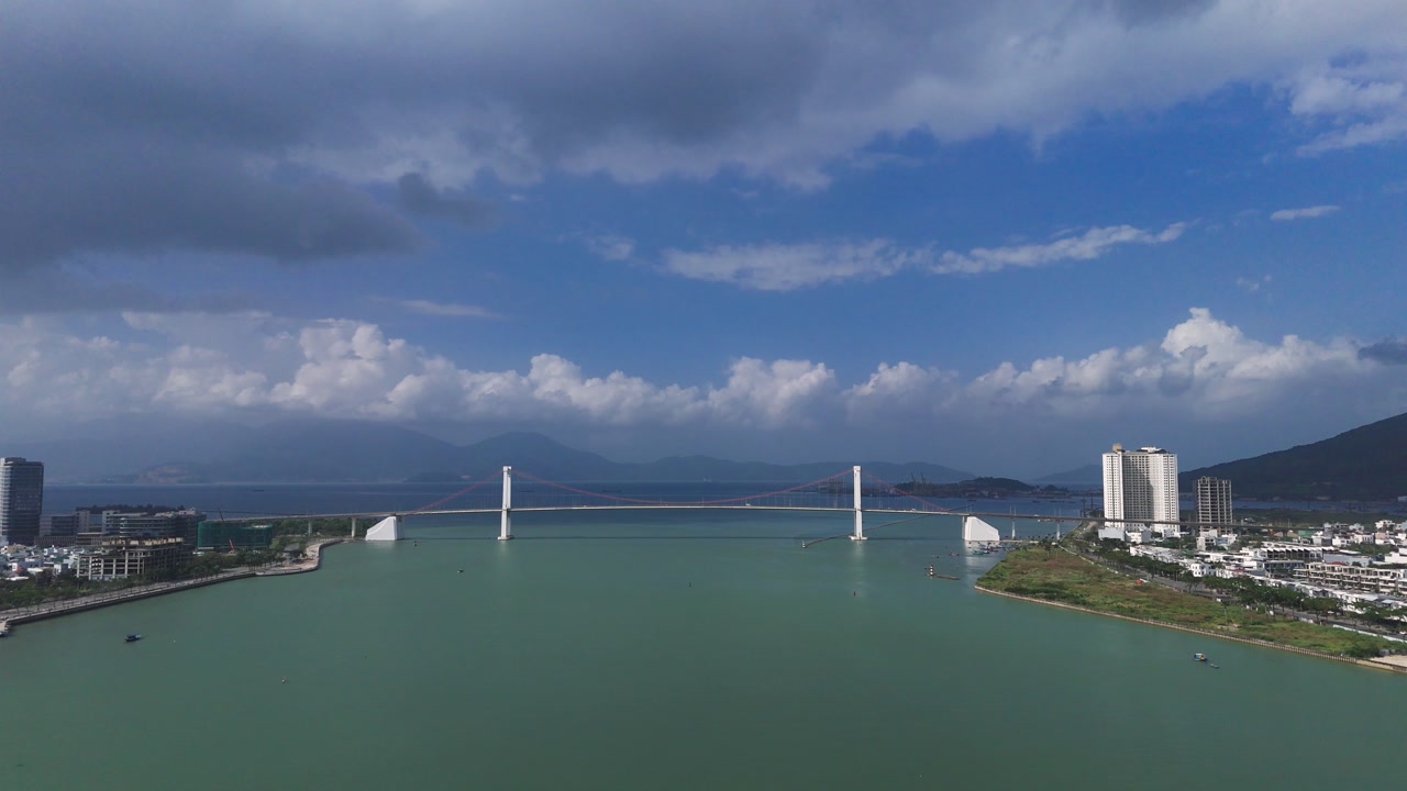 Fly over Han river towards Thuan Phuoc Bridge in Da Nang