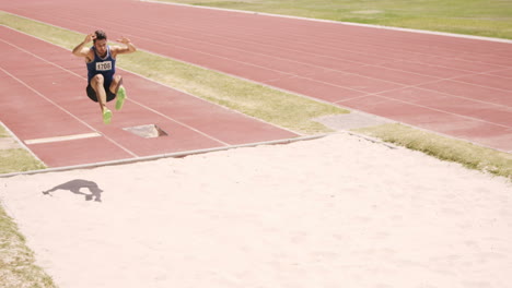 sportsman doing long jump