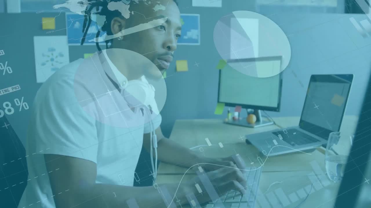 Animation of financial data processing over businessman working in office