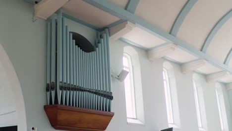 beautiful large organ pipes inside a modern clean white church