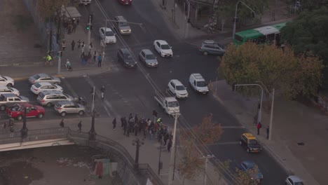 santiago de chile morning street corner people and cars