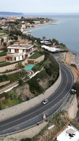 Scenic Coastal Road with Houses