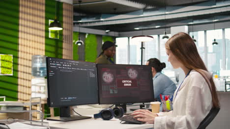 Female Programmer In Startup Office Struggling To Fix Application Errors