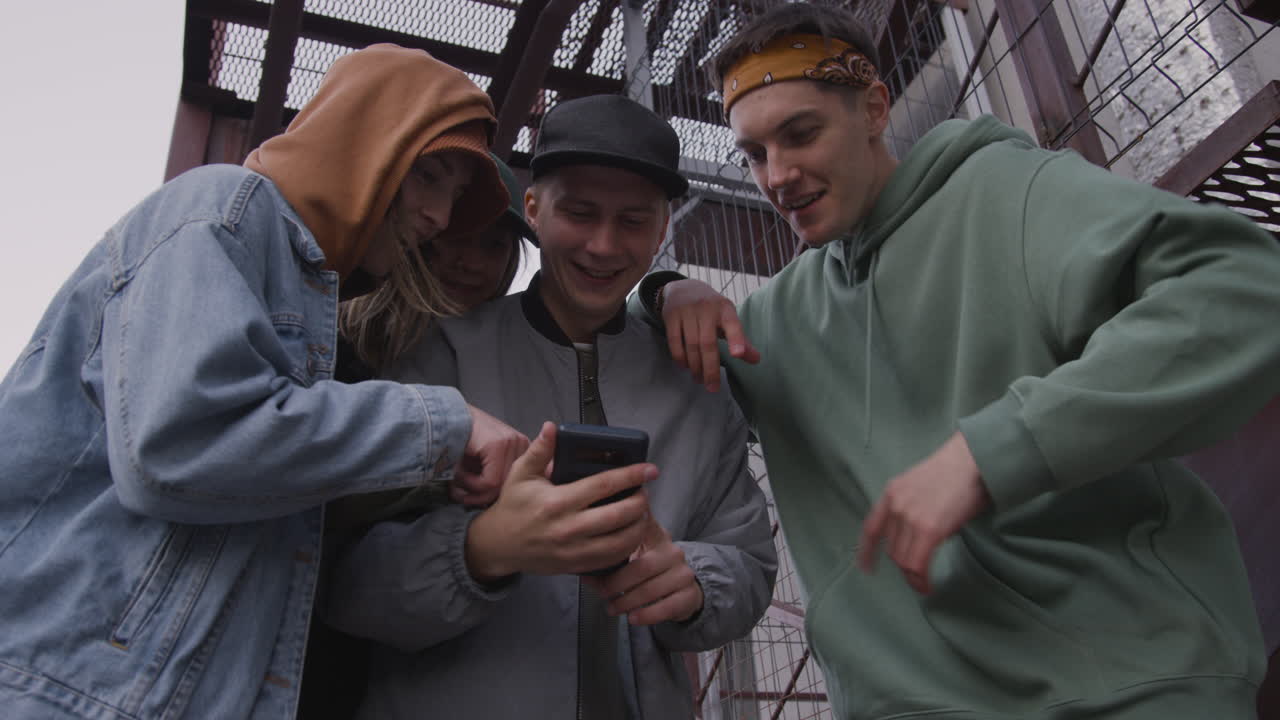 Young dancers with smartphone