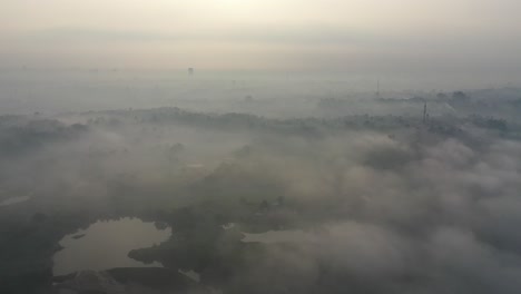 misty sunrise over a cityscape