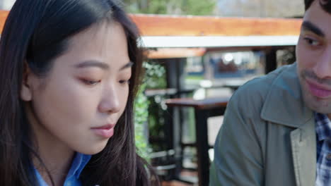 young coworkers having talk at outdoors