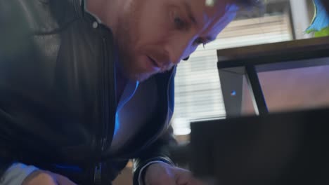 Secret agent or spy opening a drawer and taking out classified files while looking around cautiously. Covert operation, espionage, intelligence, top secret, surveillance, undercover, secret mission