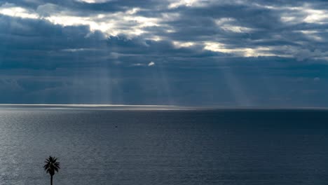 time-lapse of swirling clouds and bursting sun rays