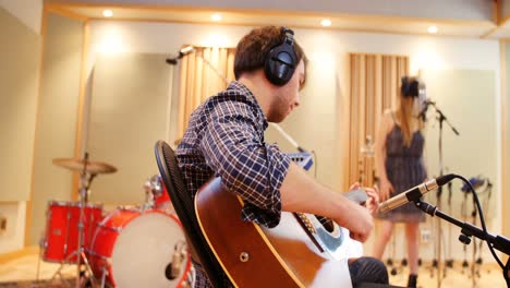 music band performing in a studio