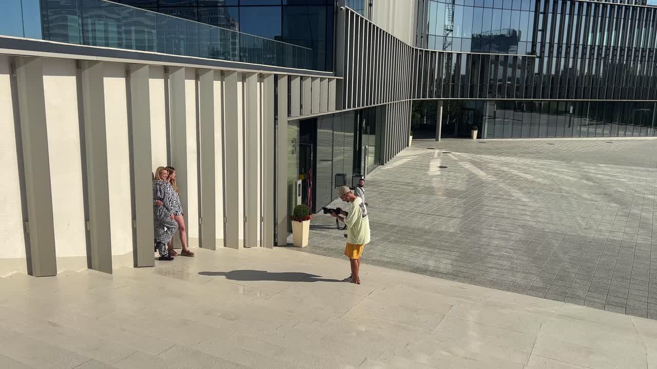 People taking photos in an urban environment