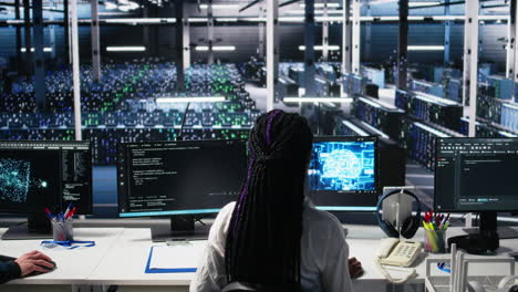 technicians in data center review ai diagnostics, analyzing neural networks