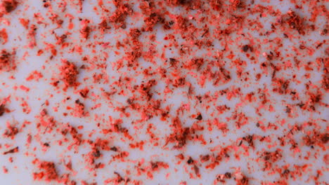 red sprinkles on a light surface