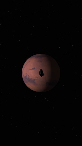 vertical video of space asteroid passing by camera heading towards red planet mars with stars background. 3d science animation.