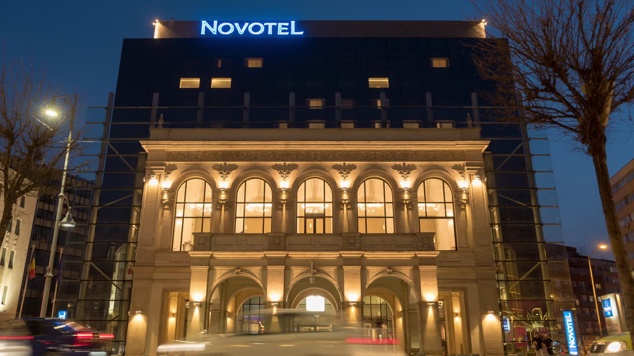 Novotel hotel  time lapse at night Victory avenue Bucharest, Romania