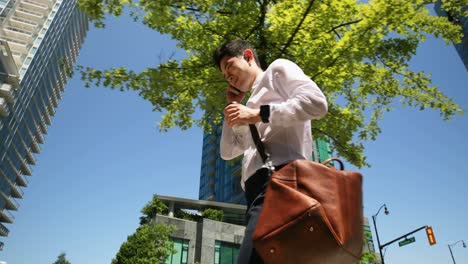 man talking on mobile phone and walking on streets 4k