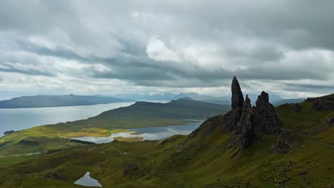 the old man of storr rock formation on the mountain on trotternish peninsula of isle of skye in scotland. - wide pan shot