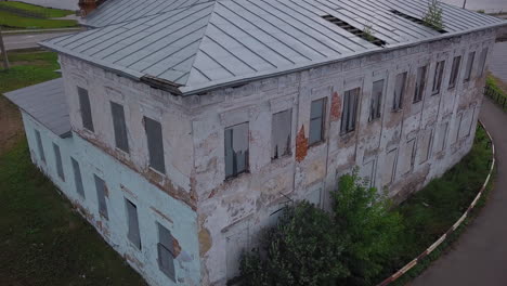 abandoned historic building by a river