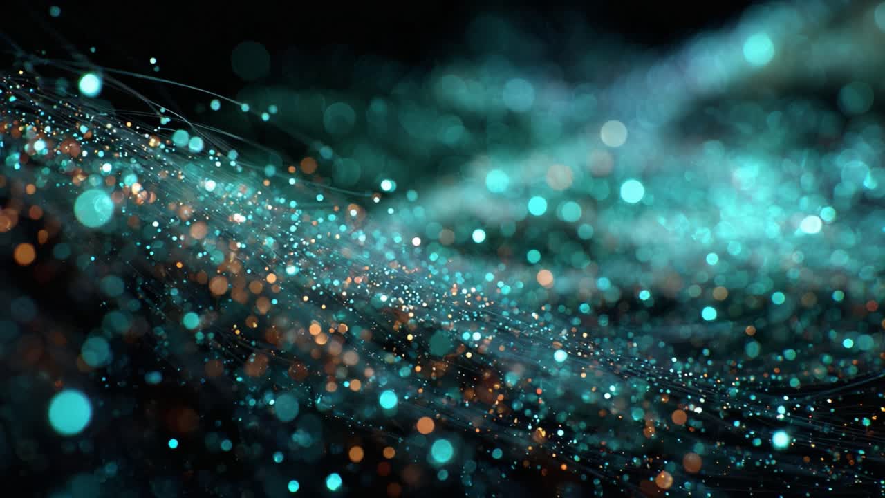 Abstract teal and orange glowing particles and lights flowing in a gentle wave like motion, creating a beautiful bokeh effect on a dark background for a magical and celebratory concept