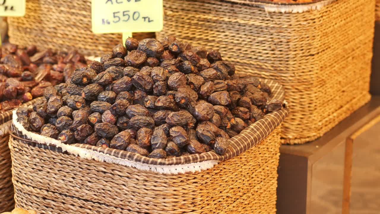 Dried Dates in Baskets at a Market