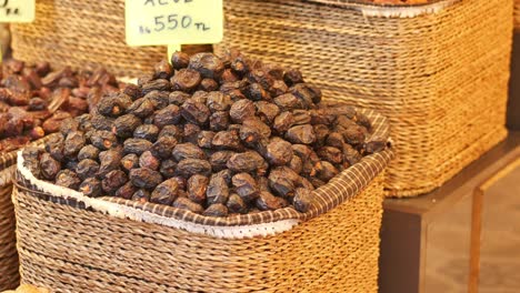 dried dates in baskets at a market