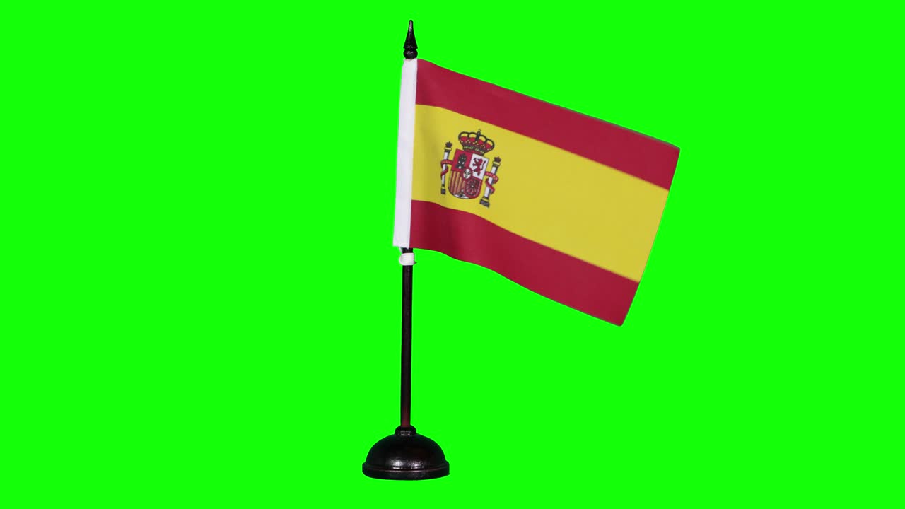 bandera en miniatura de españa revoloteando en un mástil
