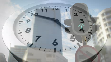 animation of clock moving over traffic light and skyscrapers