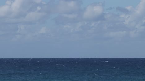 timelapse of ocean horizon under changing clouds