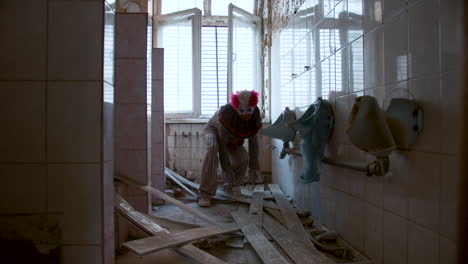 scary clown in abandoned house