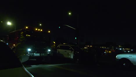 fire truck and ambulance arrive at night