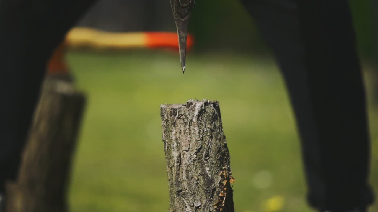 Afternoon standing footage and other perspective view with the scene of human hand cutted firewood at home