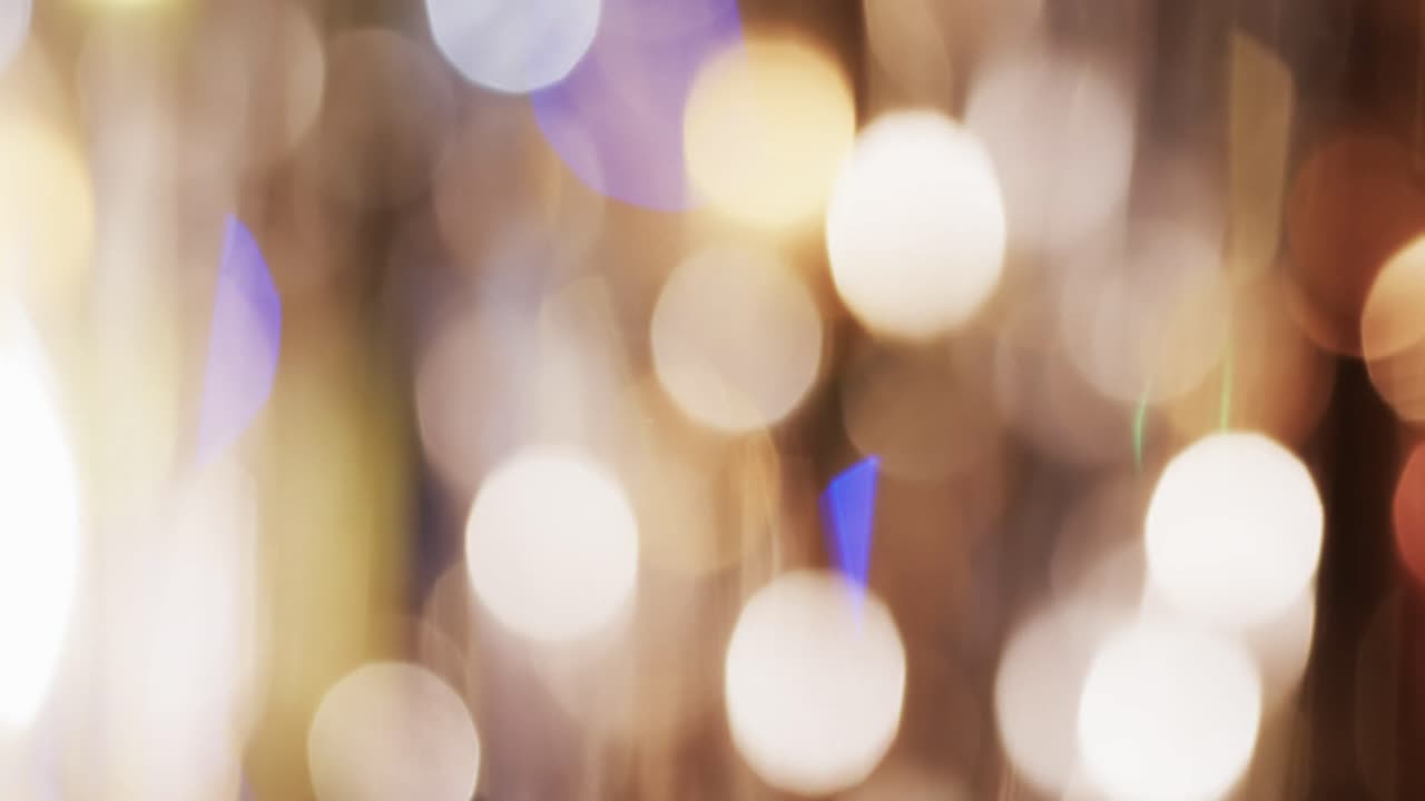 video de puntos de luz bokeh amarillos parpadeantes con espacio de copia