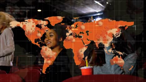 animation of covid 19 data processing with world map over people in cinema