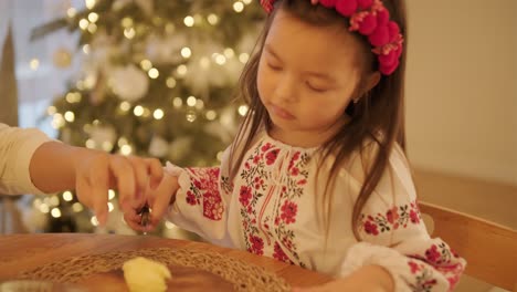 mother and daughter preparing for christmas celebration