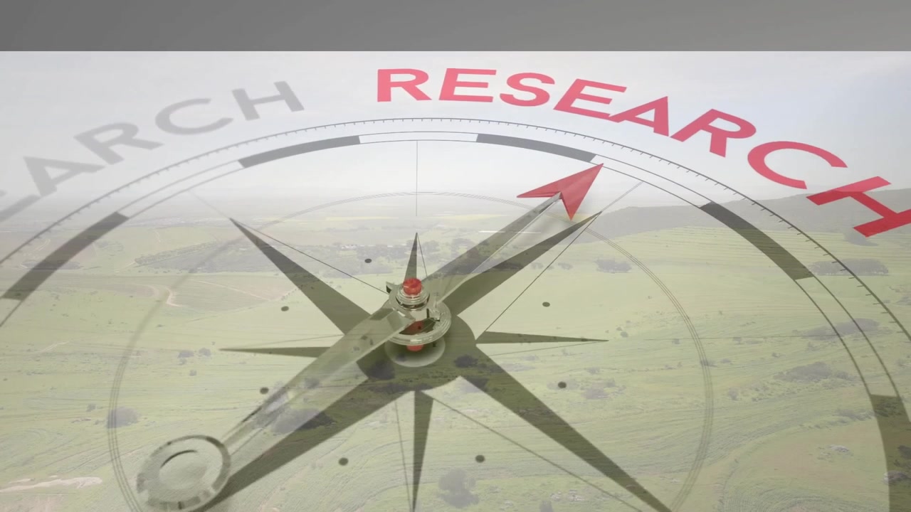 Flat design compass guiding research over green fields, highlighting discovery path
