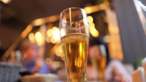 glass of light beer on a pub.