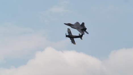 f-22 and a-1 close formation flight usaf heritage demonstration team