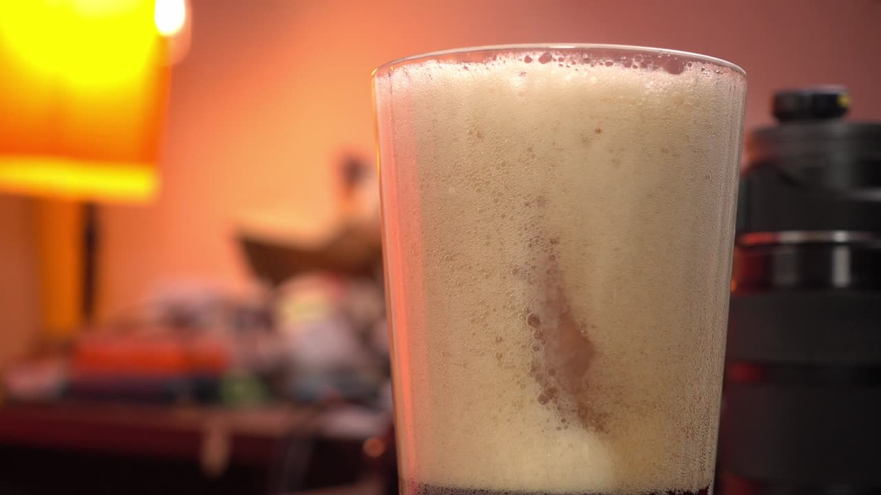 Glass of beer with foam